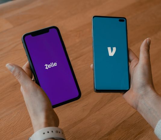 Common Reasons for Zelle Account Suspension: Understanding the Cause person holding black android smartphone